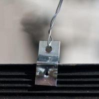 Fugaszalag-rögzítő kapocs 